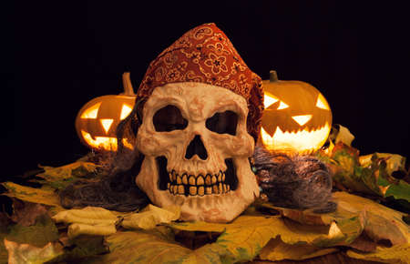 Scary halloween mask with pumpkinsの写真素材