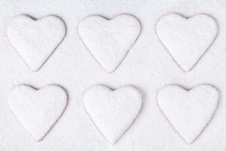 Heart shaped cookies with sugar powder for valentine's day holidayの写真素材