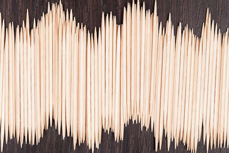 Group of small bamboo toothpicks on vintage background