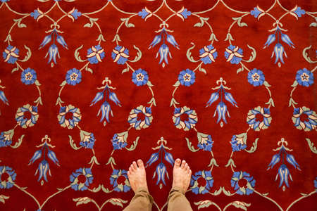 Red carpet  in Blue Mosque Sultanahmet interior beauty Turkish architecture Muslim landmark