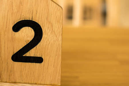 Number two black wooden floor.selective focus