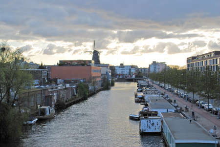 Amsterdam Canal and Windmillの写真素材