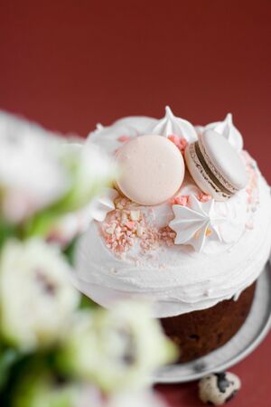 Easter cake kulich. selective focus. Traditional easter sweet bread decorated with meringues and...