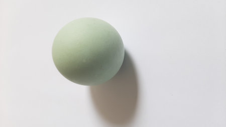A salted duck egg is an East Asian preserved food product made by soaking duck eggs in brine, or packing each egg in damp, salted charcoal.の写真素材