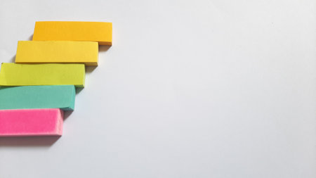 Pastel and Neon Sticky Notes or Paper Index or Page Marker or Flags Tabs or Note Adhesive Post Highlighter or Memo Pads for Highlighting Documents on Isolated White Backgroundの写真素材