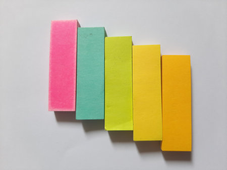 Pastel and Neon Sticky Notes or Paper Index or Page Marker or Flags Tabs or Note Adhesive Post Highlighter or Memo Pads for Highlighting Documents on Isolated White Backgroundの写真素材