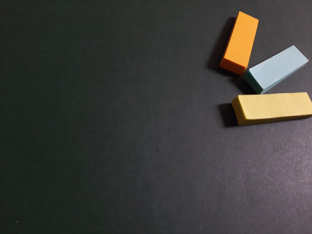 Pastel and Neon Sticky Notes or Paper Index or Page Marker or Flags Tabs or Note Adhesive Post Highlighter or Memo Pads for Highlighting Documents on Isolated Dark Backgroundの写真素材