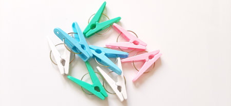 Colorful Plastic Clothespins or Cloth Clip Mixing Colors. Colour Clothes Peg. Home equipment.の写真素材