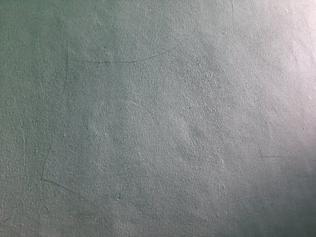 Empty solid grey or gray paint wall background with sunlight.の写真素材
