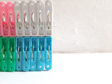 Colorful Plastic Clothespins or Cloth Clip Mixing Colors. Colour Clothes Peg. Home equipment.の写真素材
