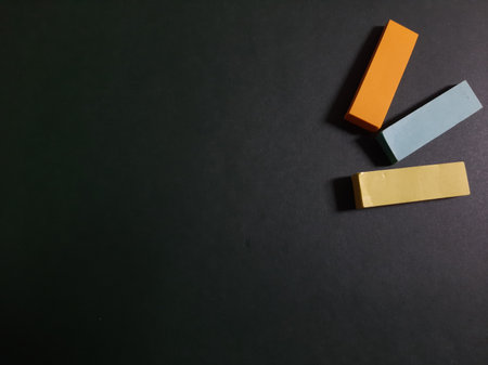 Pastel and Neon Sticky Notes or Paper Index or Page Marker or Flags Tabs or Note Adhesive Post Highlighter or Memo Pads for Highlighting Documents on Isolated Dark Backgroundの写真素材