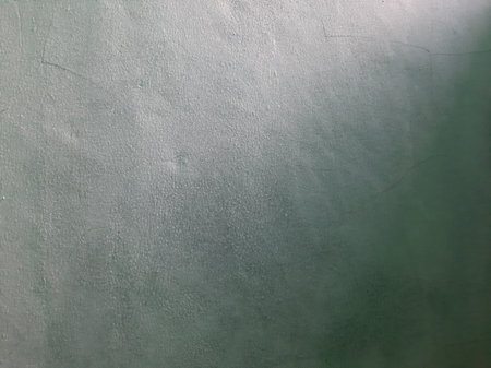 Empty solid grey or gray paint wall background with sunlight.の写真素材