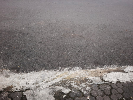 Grey asphalt road or street pavement textureの写真素材