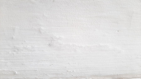 White paint wall texture background with sunlightの写真素材