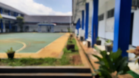 Defocused school field environment on a sunny day