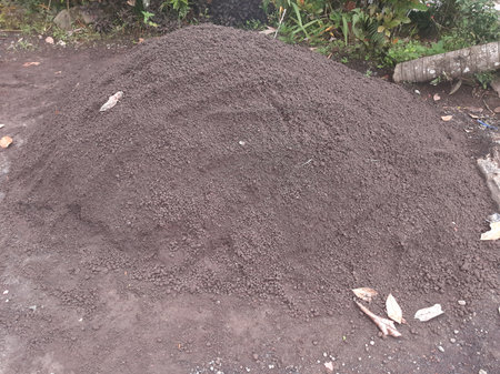 Pile of dark sand or soil for constructionの写真素材