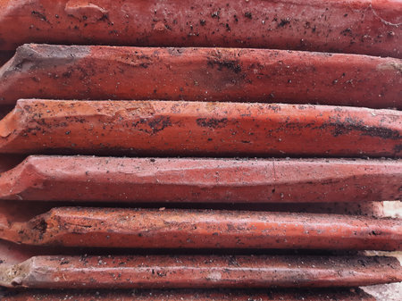 stack of unused clay roof tilesの写真素材