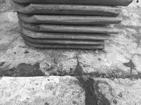 monochrome stack of unused clay roof tilesの写真素材