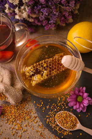 healthy tea, honey, honeycomb and lemon products for immunity