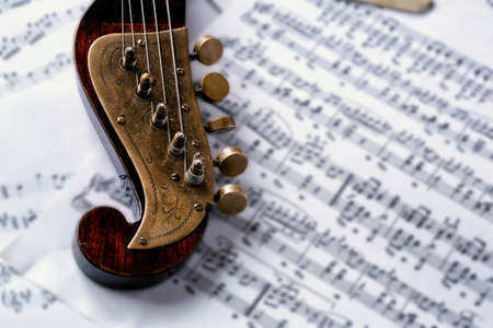 detail old musical instrument and sheet music backgroundの写真素材