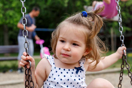 Cute little girl at playgraundの写真素材