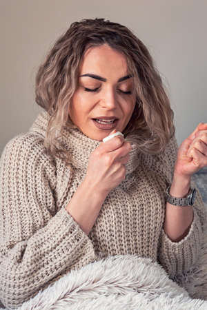 Woman caught cold, flu, running nose. Healthcare and medical concept