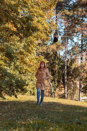 Red hair woman in relaxing nature