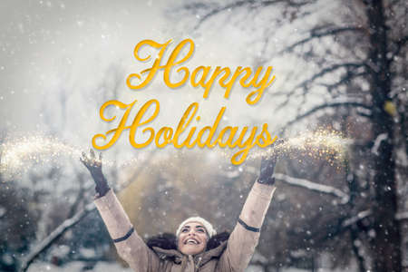 Happy holidays, winter, Christmas and people concept â Smiling young girl in winter time at nature.の写真素材