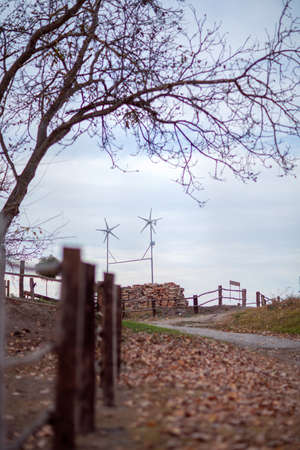 Windmill for electric power production equipment Alternative electricity concept backgroundの写真素材