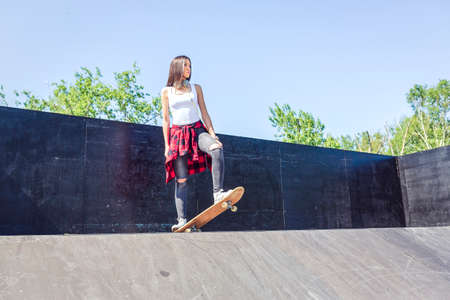 Skateboarder - Cool urban skater teen girl