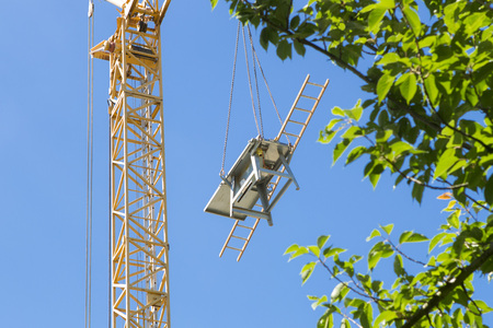 Construction Area with crane during weekend with blue skyの写真素材