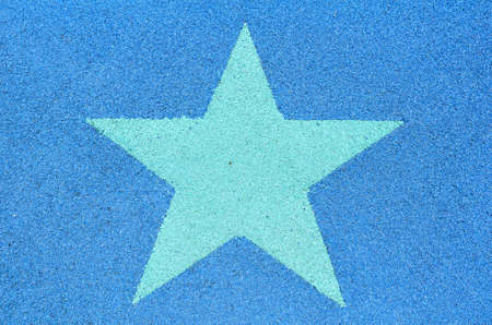 Green star label decorated on jogging laneの写真素材