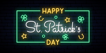 Happy Saint Patrick's Day neon sign. Horizontal Bright signboard with Text. Vector St. Patricks Day light banner.のイラスト素材
