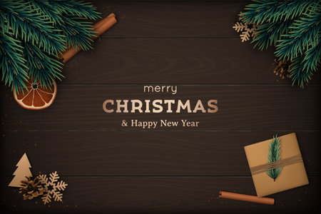 Festive design template with winter decor on dark brown wooden background. Flat lay composition with fir tree branch, cinnamon, orange slice, gift craft box and pine cone for social media, website etcのイラスト素材