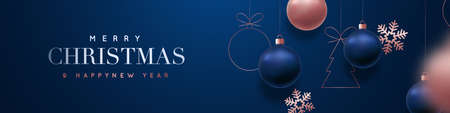 Merry Christmas and Happy New Year vector banner. Realistic rose gold and blue baubles, snowflakes hanging on dark blue background. Christmas balls motion blur effect. Luxury background.のイラスト素材