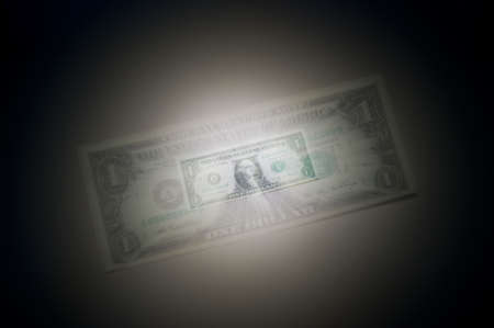 shrinking zooming dollarの写真素材