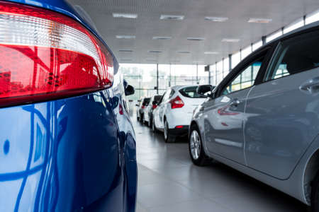 Stock of cars in showroom of automobile dealer