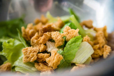 Fresh rustic Caesar salad served in restaurantの写真素材