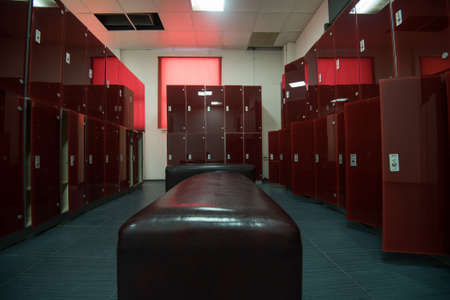 Cloakroom in fitness center with boxes in the locker roomの写真素材