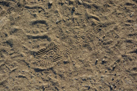 Imprint, footprint of shoe or boot on sand