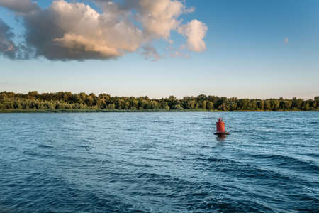 Summer beautiful landscape with river, blu sky and clouds in Russiaの写真素材