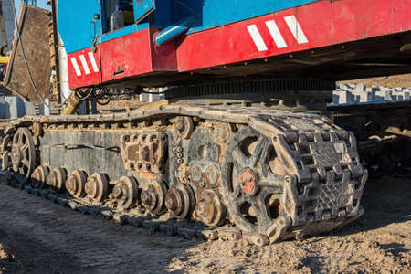 Closeup of the caterpillar track of a heavy construction machine.の写真素材