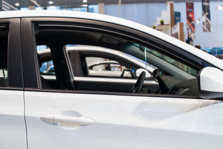 Stock of cars in showroom of automobile dealer