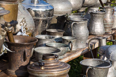Antique jugs and dishes at antique shop at oriental marketplaceの写真素材