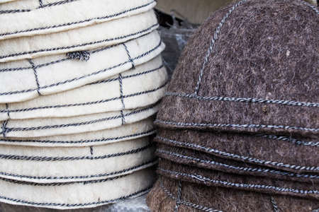 Bunch of handmade colorful woolen hats