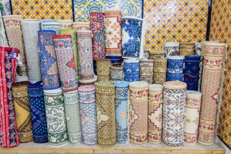 Carpets and kilims rolled upの写真素材