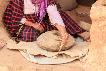 Close-up of flour manual grinding