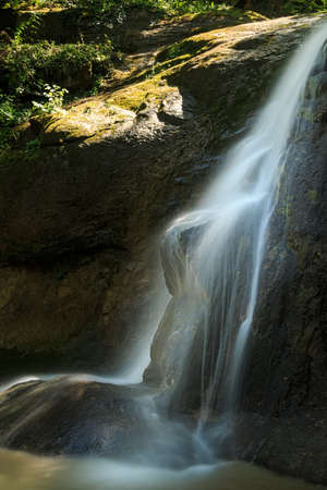 Waterfall somewhere in mountains of western Caucasus