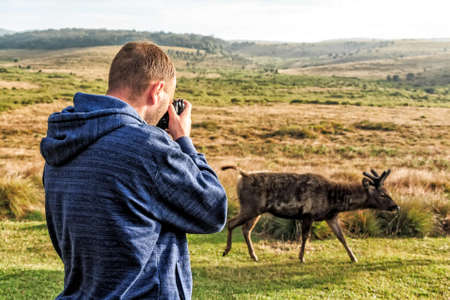 Male wildlife photographerの写真素材