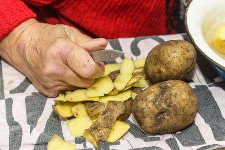 Potatoes with peelの写真素材